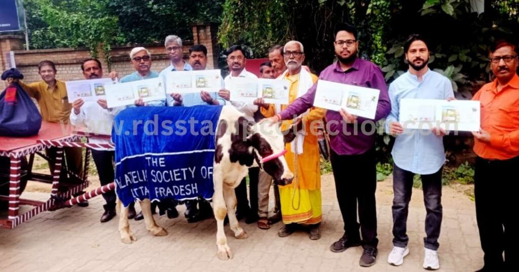 Dignitaries and members of the Philatelic Society of Uttar Pradesh displaying the release folder of Uttar Pradesh’s first Bullock Cart Carried Special Cover at the Agriculture Institute Sub-Post Office, Prayagraj. The event marked the centenary of “The Allahabad Farmer” and was graced by postal officials, university representatives, and philatelists.