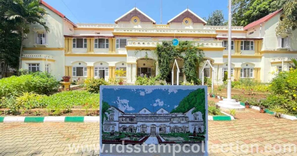 Beaulieu, the iconic CPMG Karnataka building, with the micro-embroidered postcard displayed in front during the 100th PPC release.