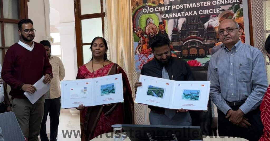 Karnataka Postal Circle officials unveiling the micro-embroidery postcards during the World Post Day 2025 release event.