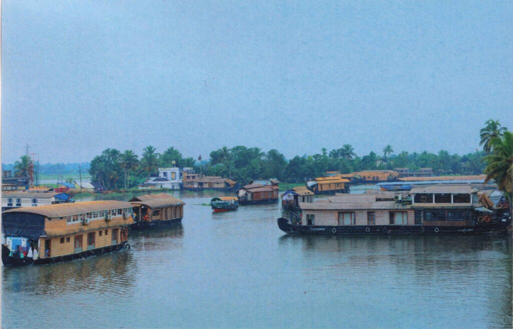 Houseboat at Alappuzha Backwaters postcard from the Alappuzha - Anchored in Serenity set issued by Kerala Postal Circle during KERAPEX 2026.